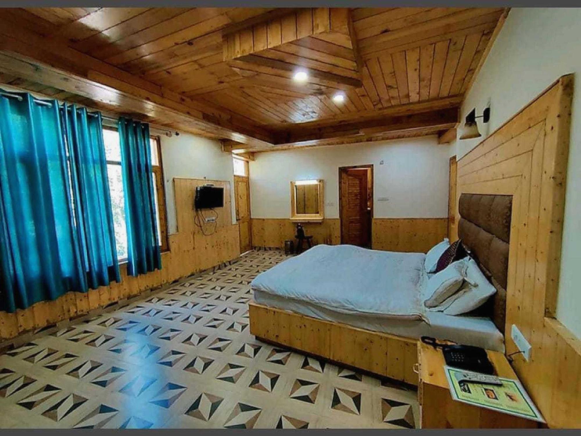 Hotel O Antriksh Cottage Manāli Buitenkant foto