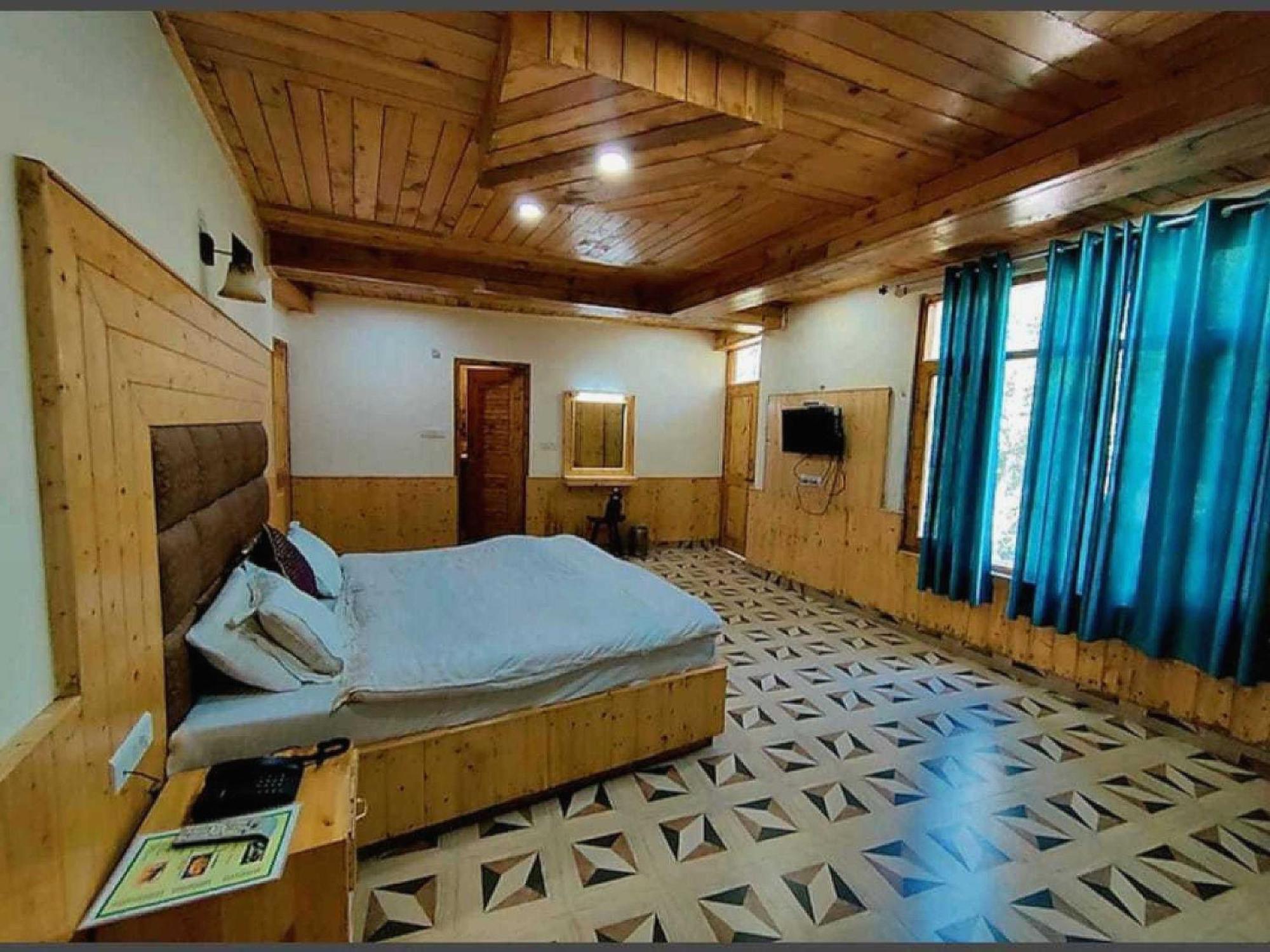 Hotel O Antriksh Cottage Manāli Buitenkant foto