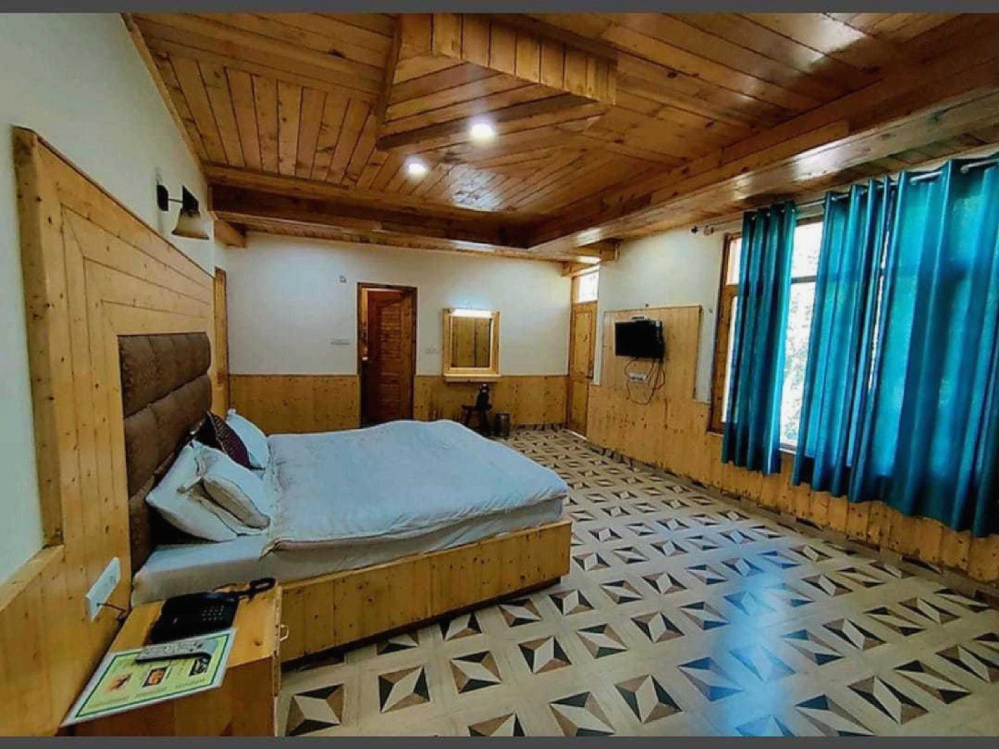 Hotel O Antriksh Cottage Manāli Buitenkant foto