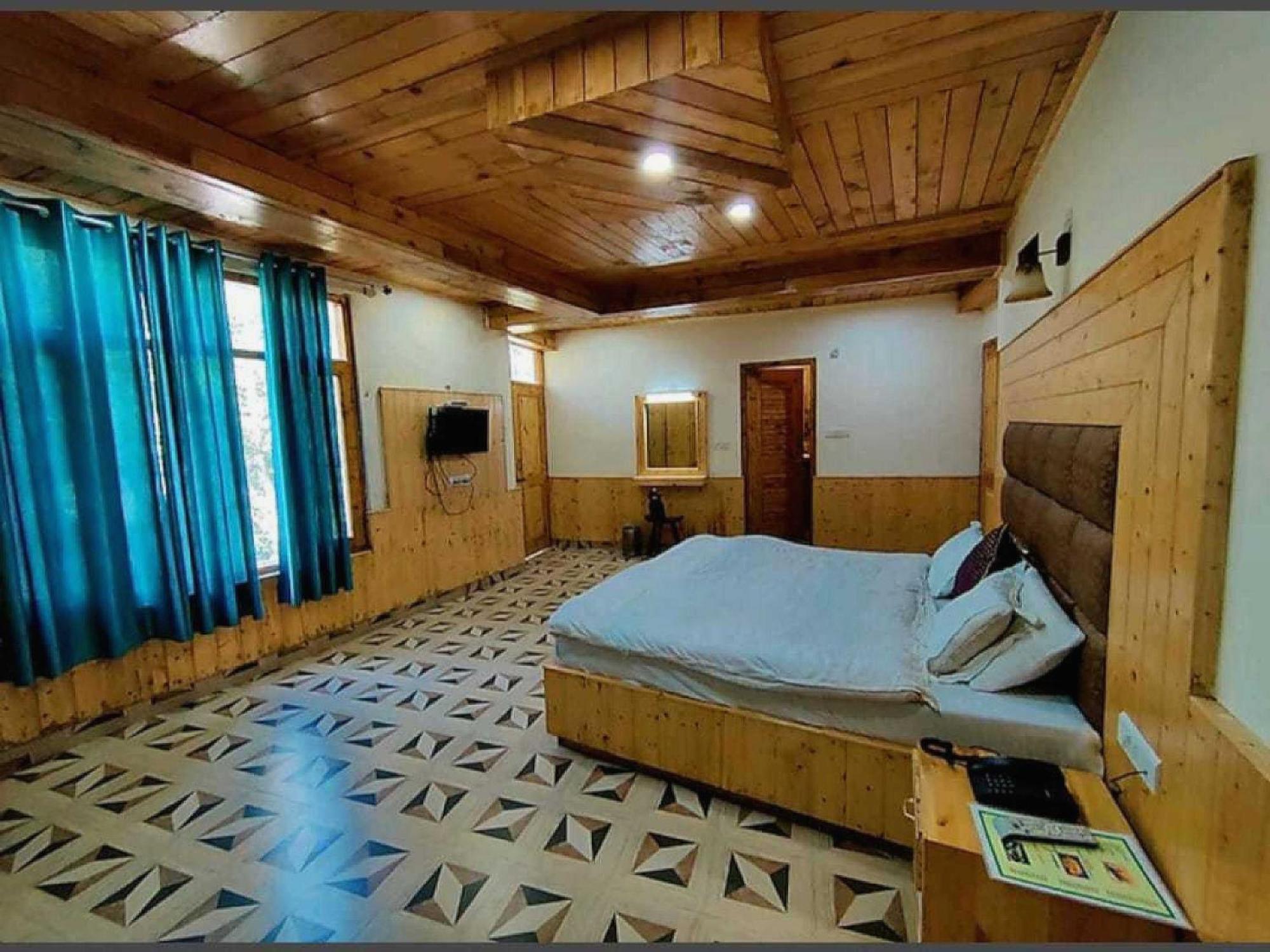 Hotel O Antriksh Cottage Manāli Buitenkant foto
