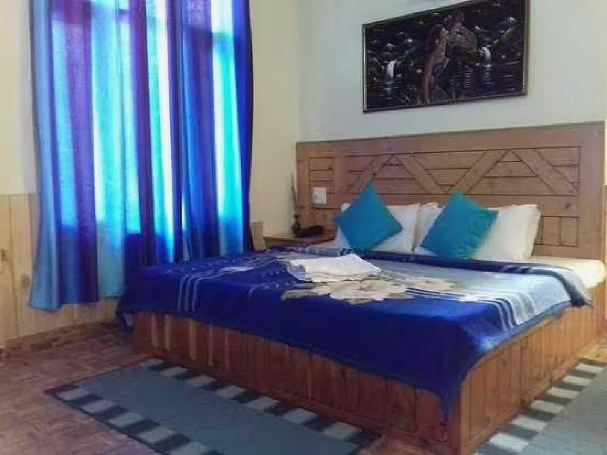 Hotel O Antriksh Cottage Manāli Buitenkant foto