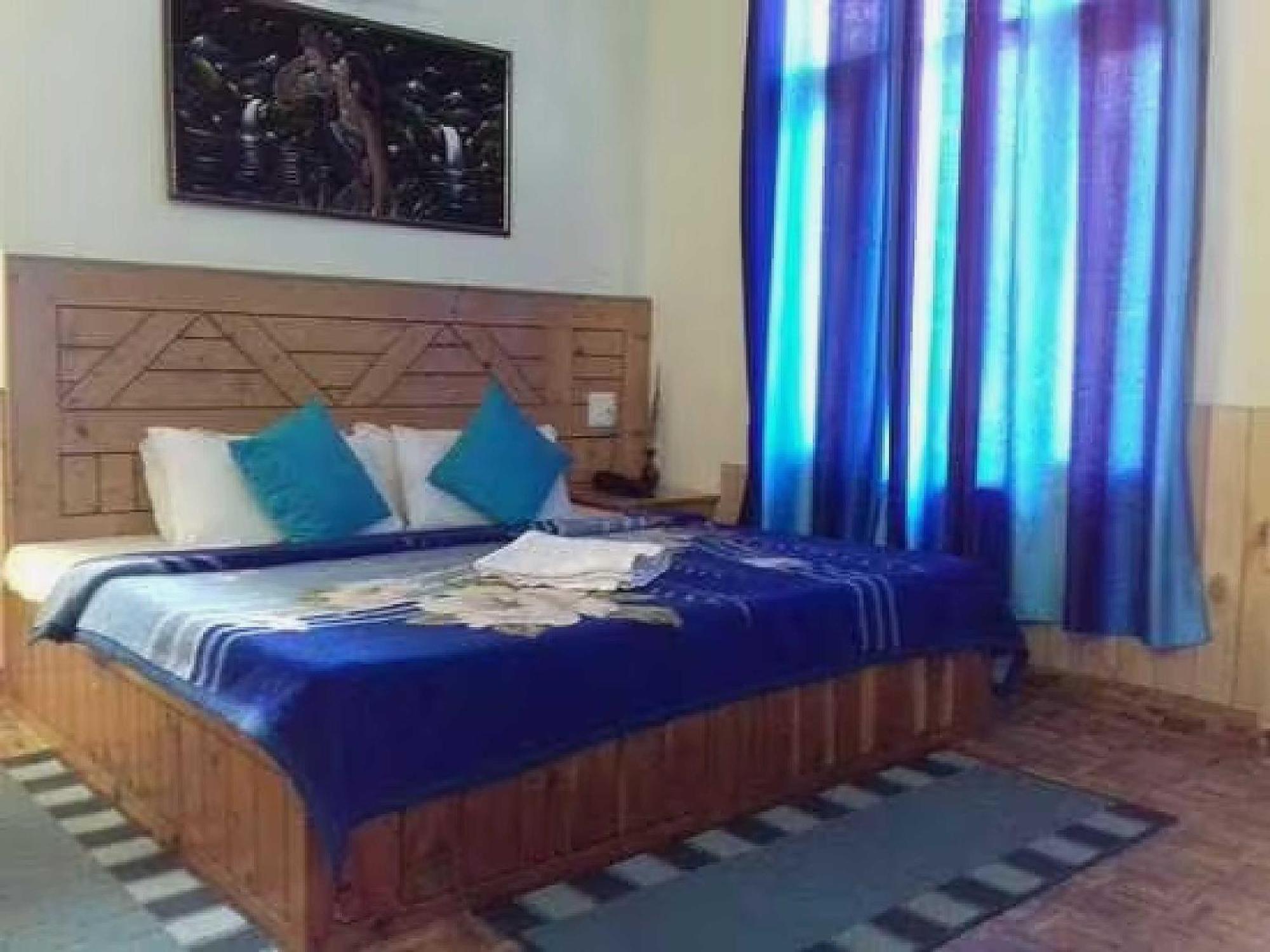 Hotel O Antriksh Cottage Manāli Buitenkant foto