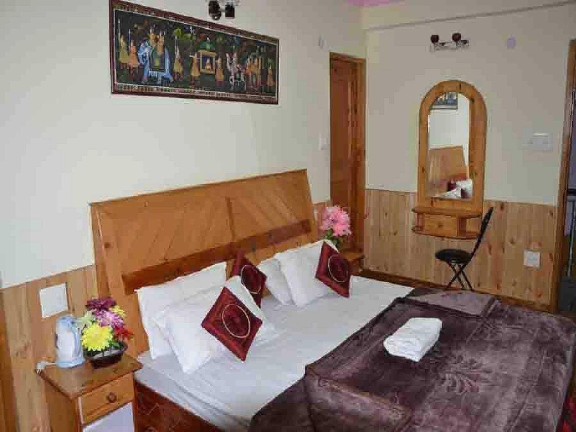 Hotel O Antriksh Cottage Manāli Buitenkant foto